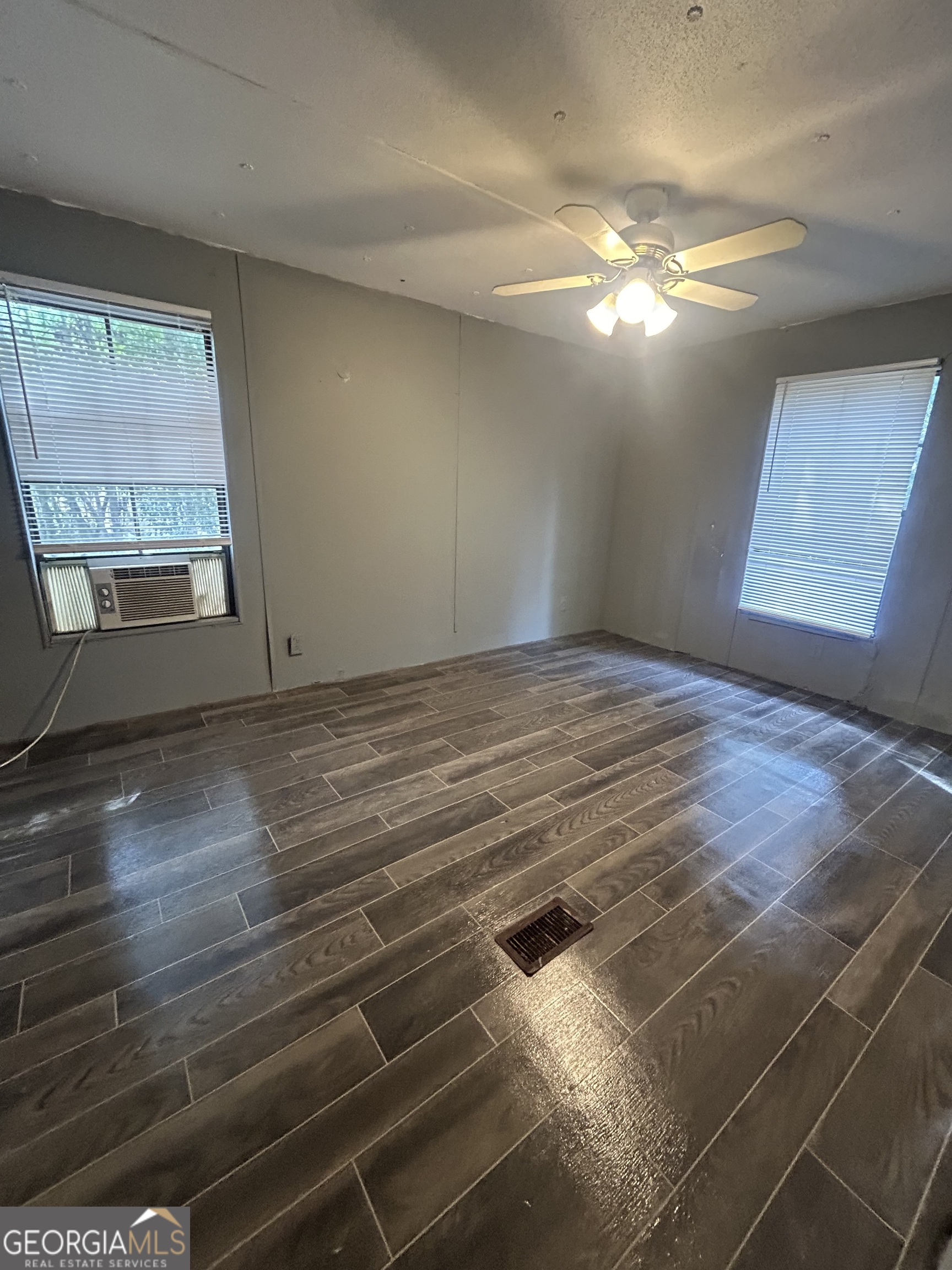 264 Lakeview Drive Locust Grove, GA 30248 - Photo 3 of 13 a view of empty room with window