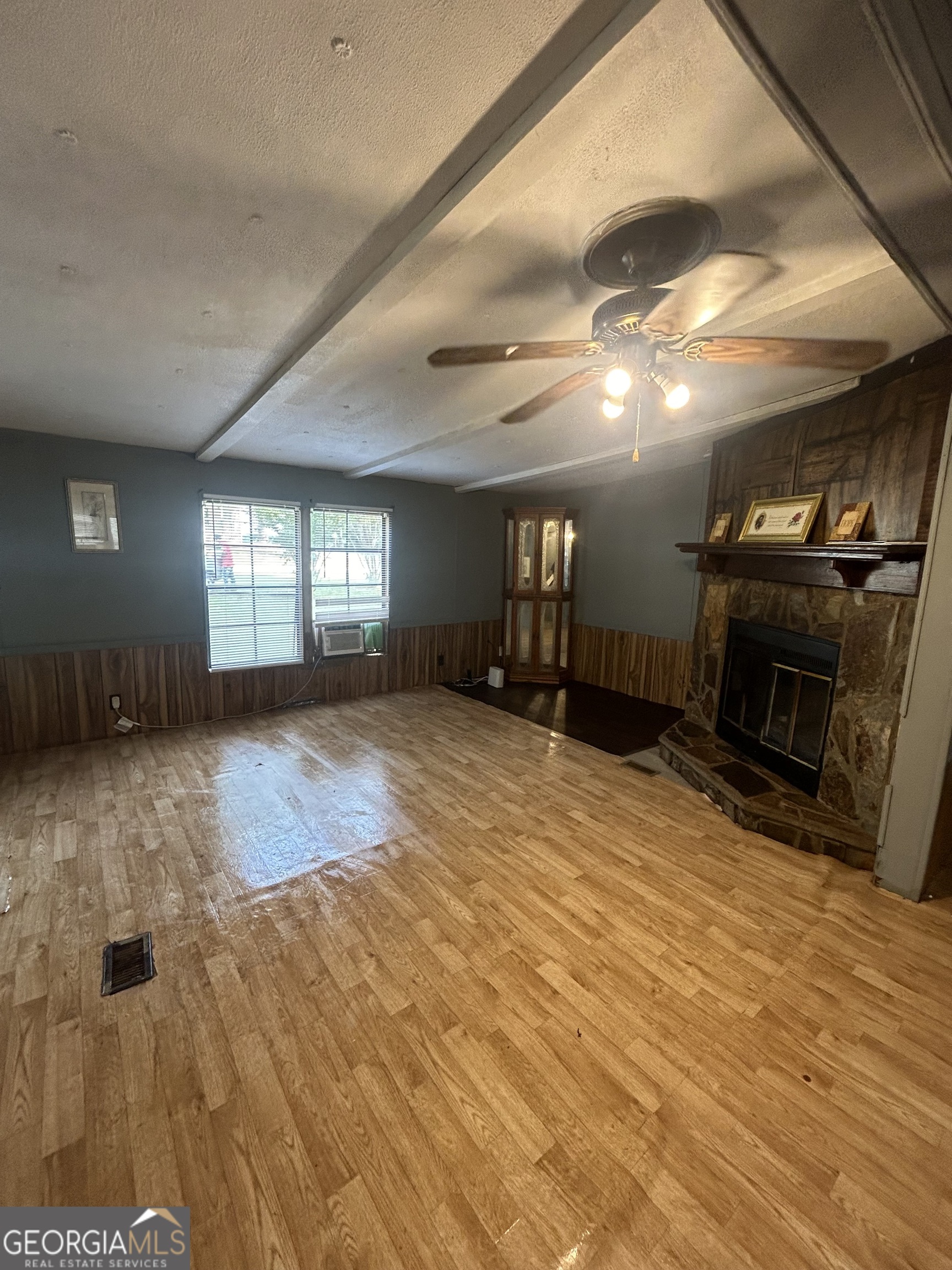 264 Lakeview Drive Locust Grove, GA 30248 - Photo 8 of 13 a view of a livingroom with a fireplace