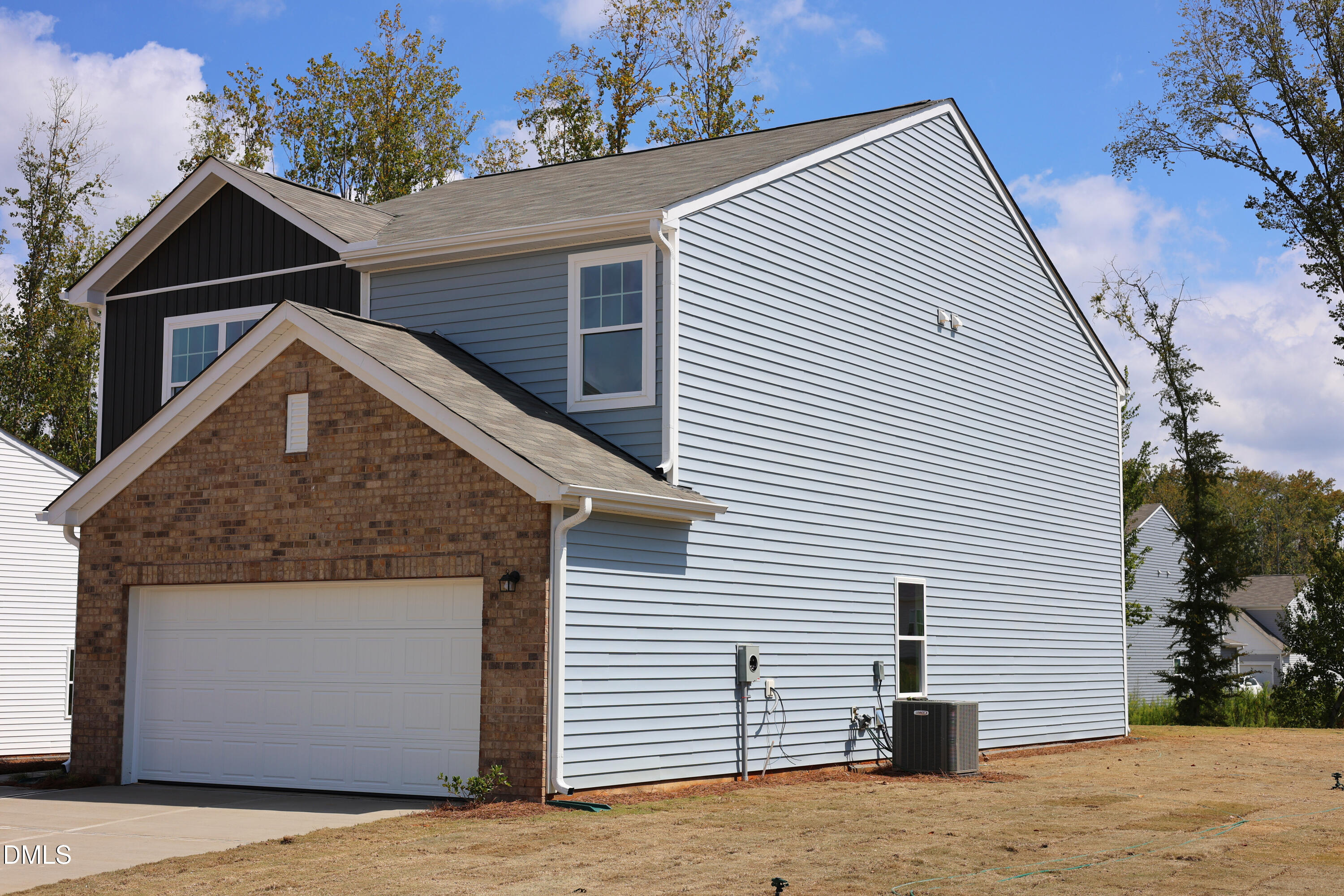 867 Embraer Way Spring Hope, NC 27882 - Photo 3 of 24 a front view of a house with a yard
