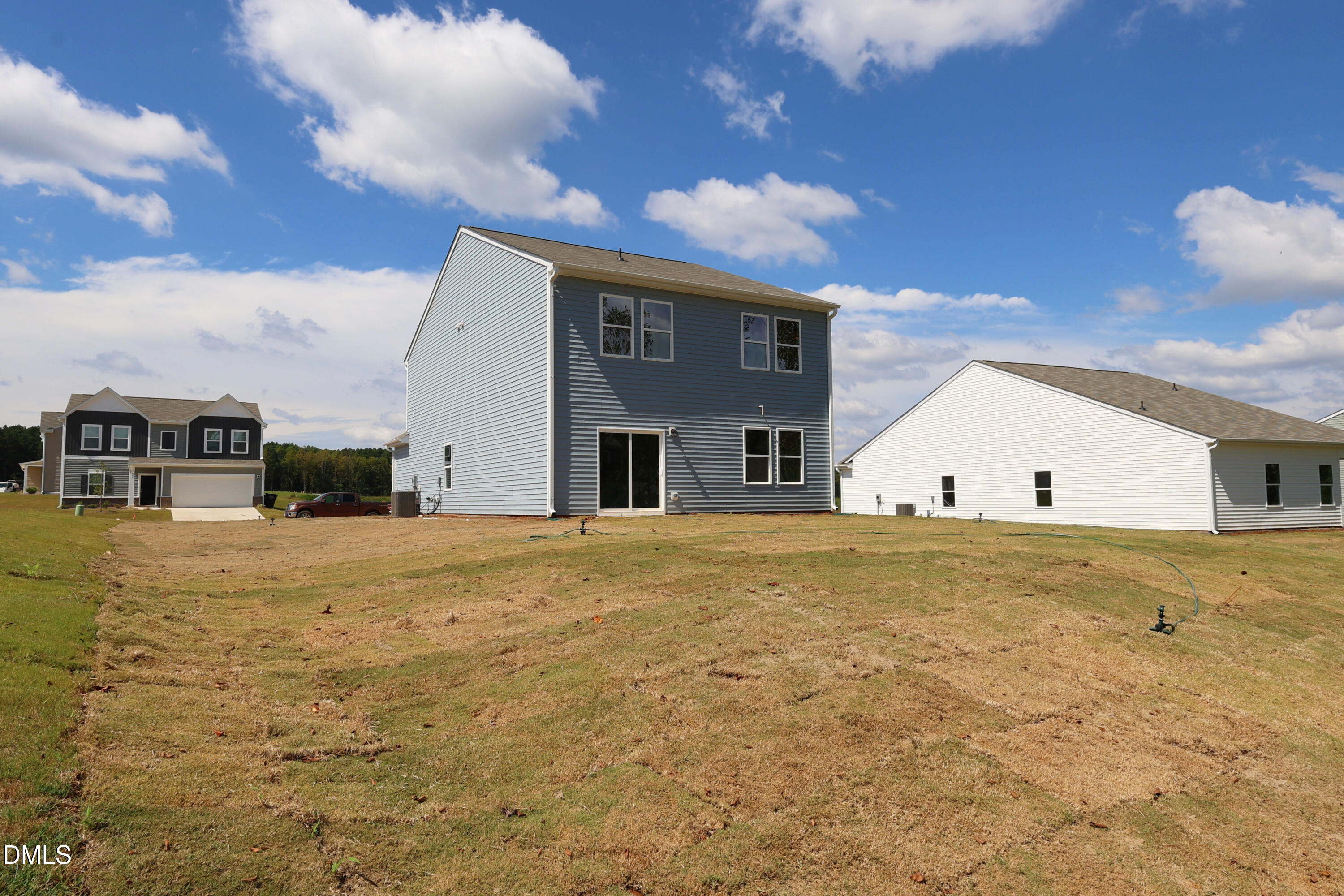 867 Embraer Way Spring Hope, NC 27882 - Photo 5 of 24 a front view of a house with a yard