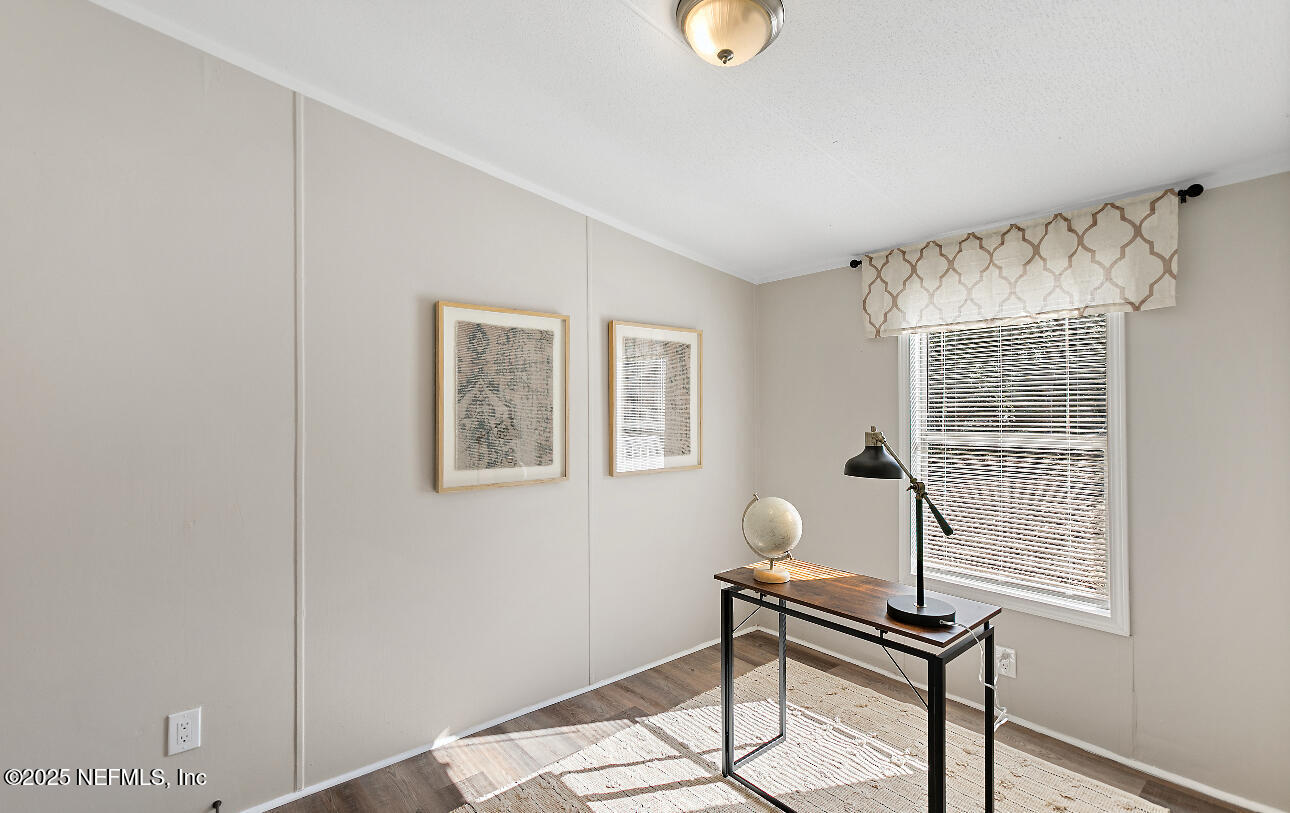 86090 Jean Road Yulee, FL 32097 - Photo 10 of 22 a view of a livingroom with furniture and window