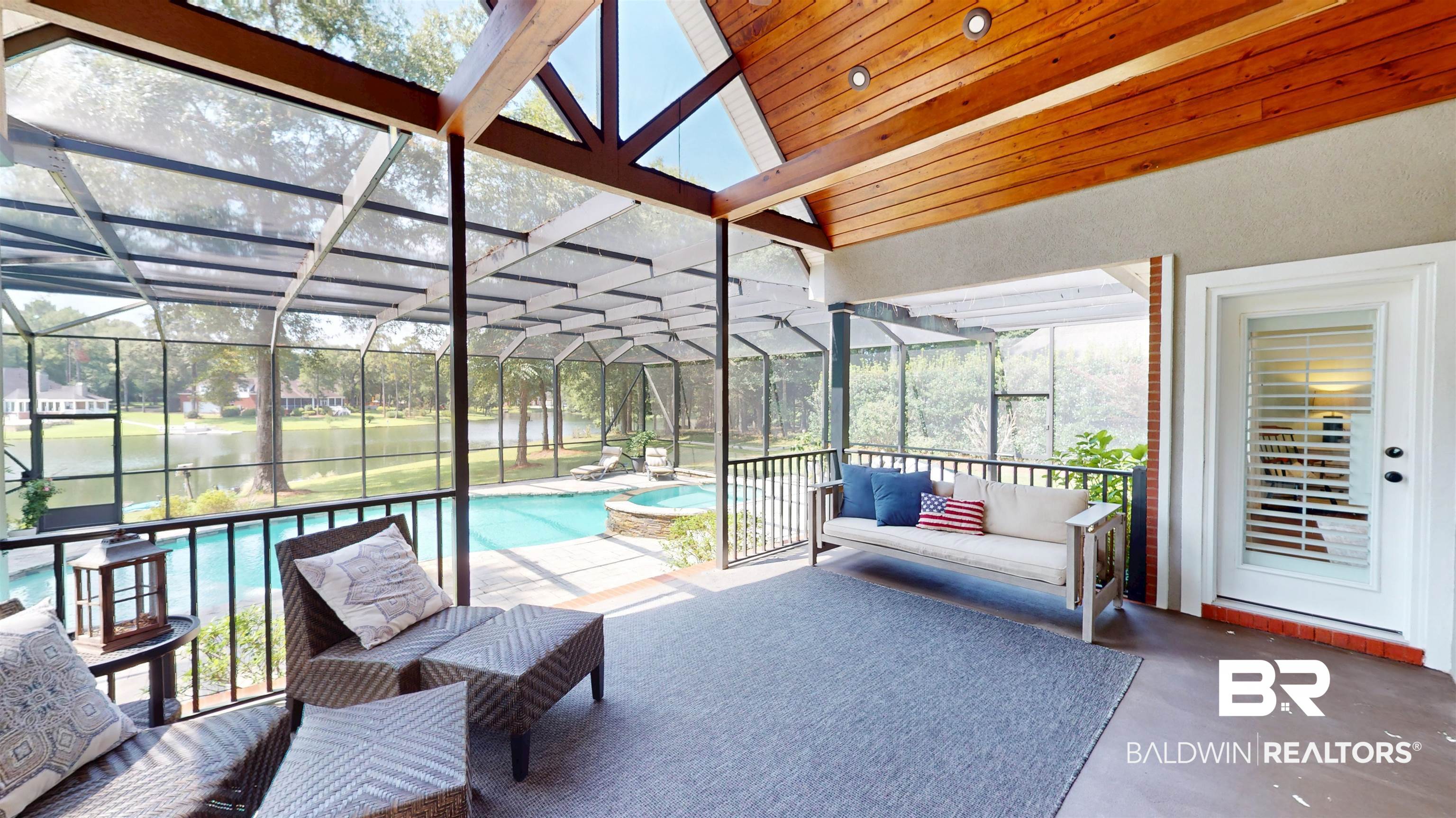 8775 Dawes Lake Road North Mobile, AL 36619 - Photo 39 of 59 Sunroom / solarium featuring lofted ceiling, a water view, and outdoor lounge area