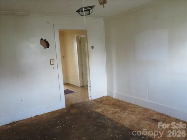 an empty room with a door