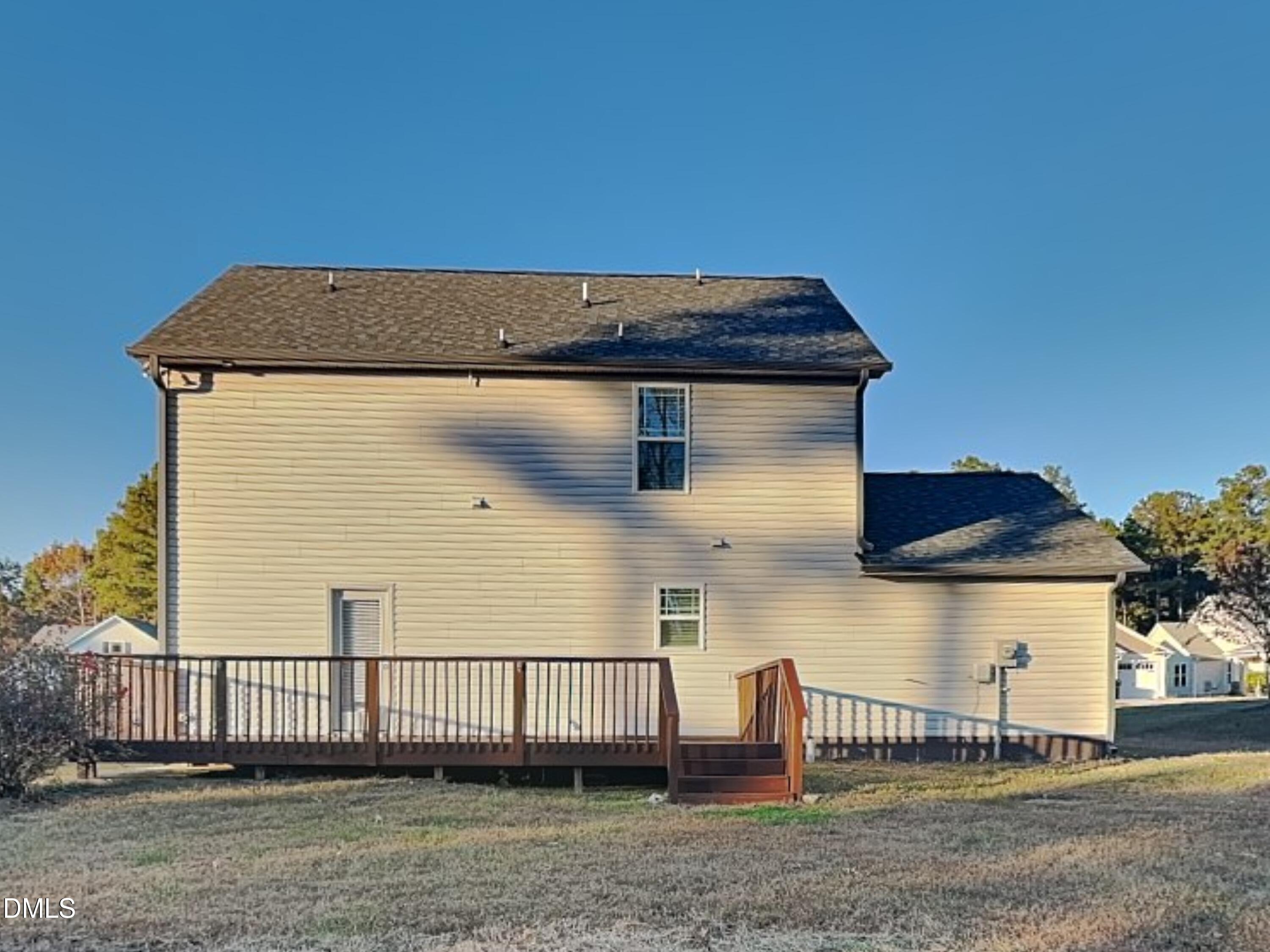 147 Cattail Lane Zebulon, NC 27597 - Photo 15 of 15 a view of a house with a yard