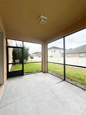 a view of a garden with an empty room
