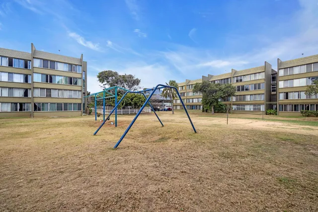 a view of a city with an ocean