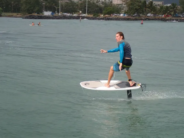 a view of a field with an ocean