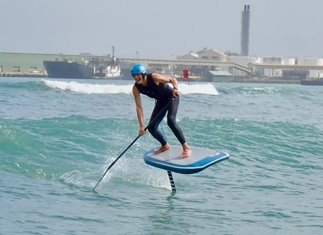 a view of outdoor space with stove and lake view