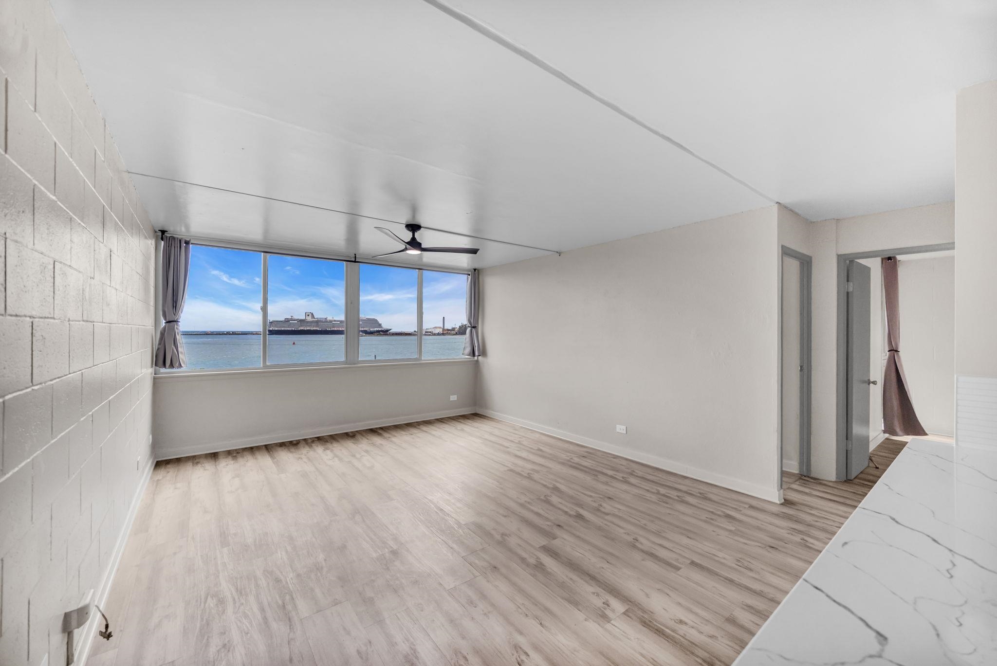111 Kahului Beach Road, Unit A310 Kahului, HI 96732 - Photo 8 of 35 a view of a room with wooden floor and brick walls