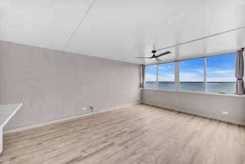 a view of room and hardwood floor