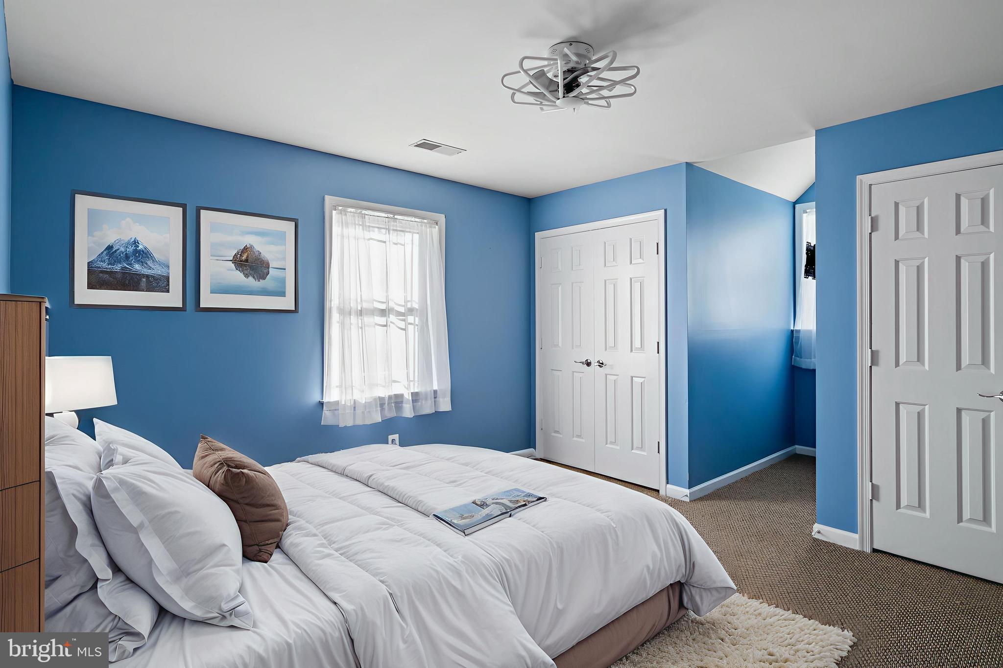 27472 Strawberry Hill Road Rhoadesville, VA 22542 - Photo 17 of 30 a bedroom with a bed and a window