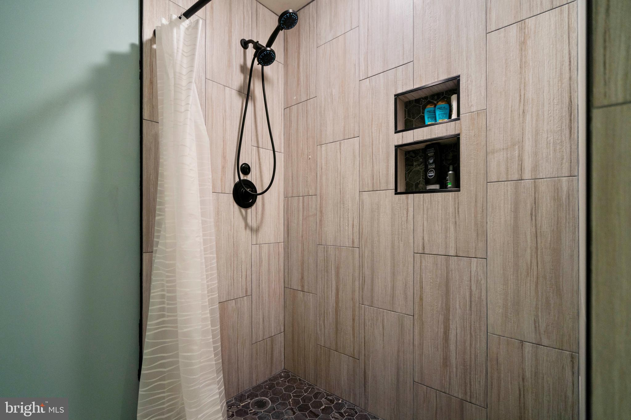 27472 Strawberry Hill Road Rhoadesville, VA 22542 - Photo 22 of 30 a bathroom with a shower