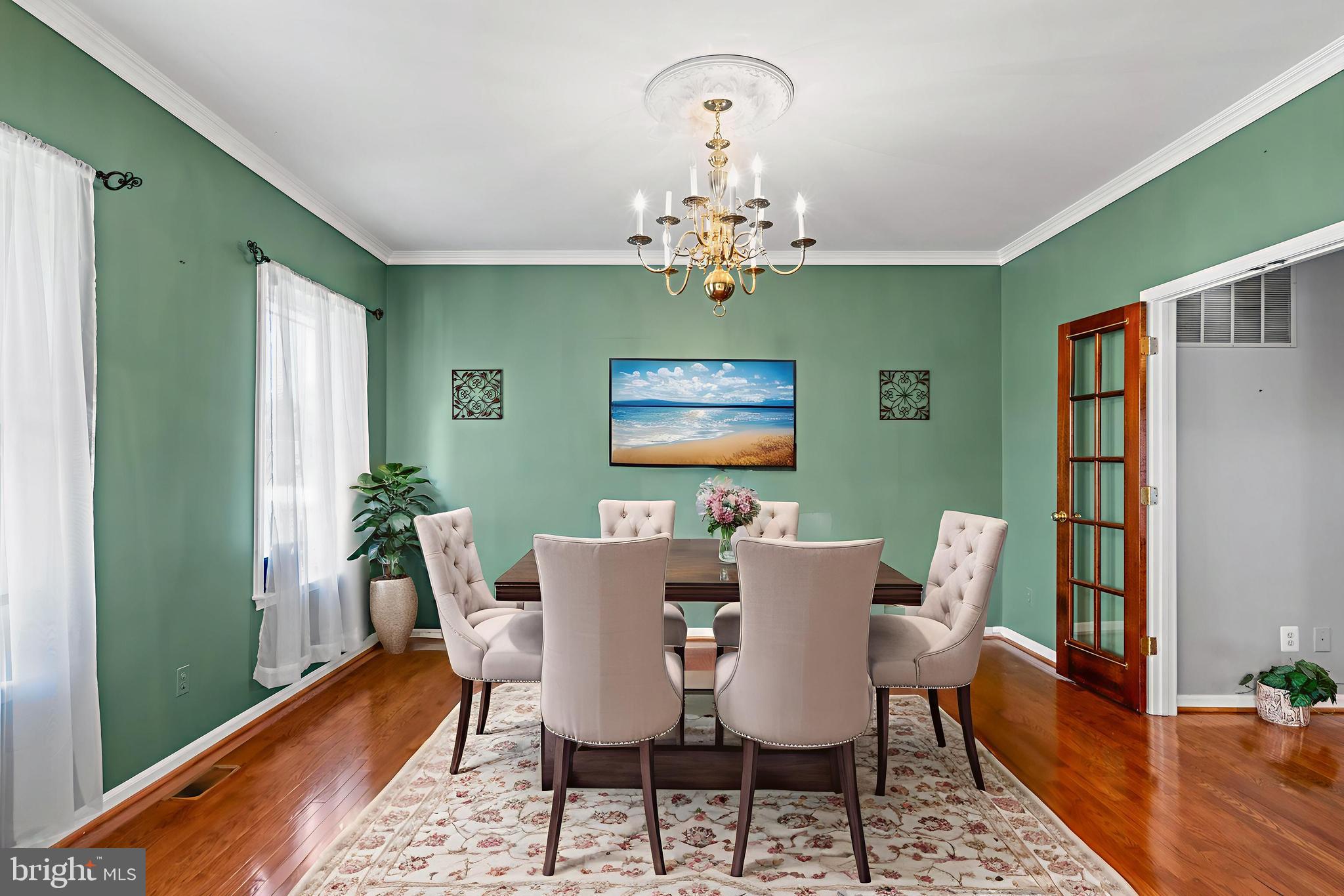 27472 Strawberry Hill Road Rhoadesville, VA 22542 - Photo 6 of 30 a view of a dining room with furniture window and wooden floor