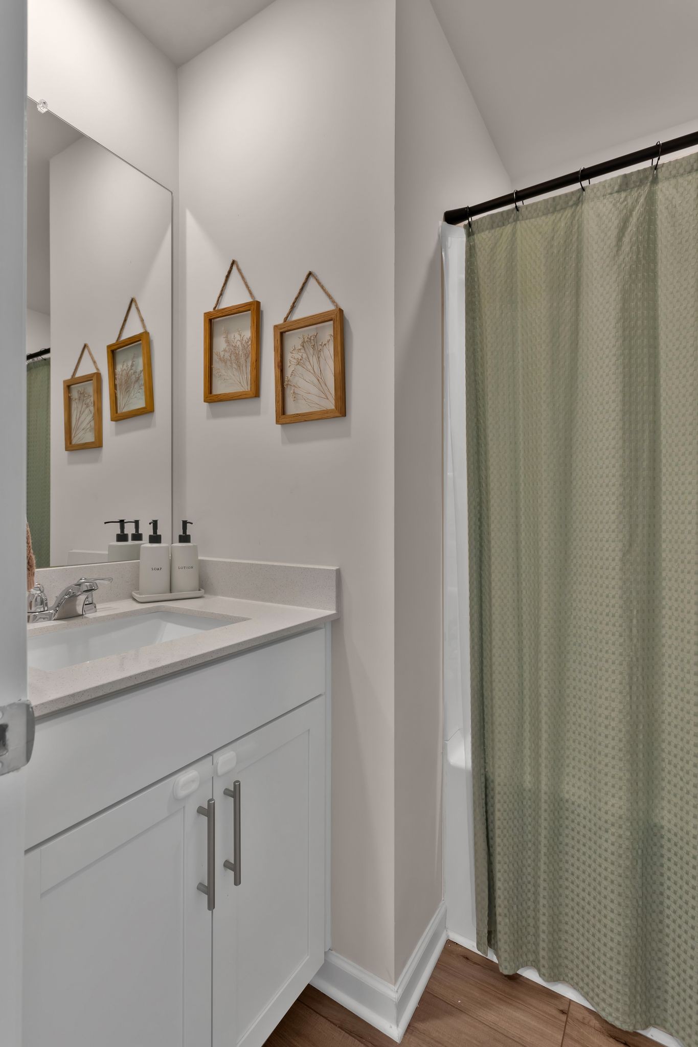 2533 Drumwright Way Columbia, TN 38401 - Photo 22 of 27 a bathroom with a double vanity sink and mirror