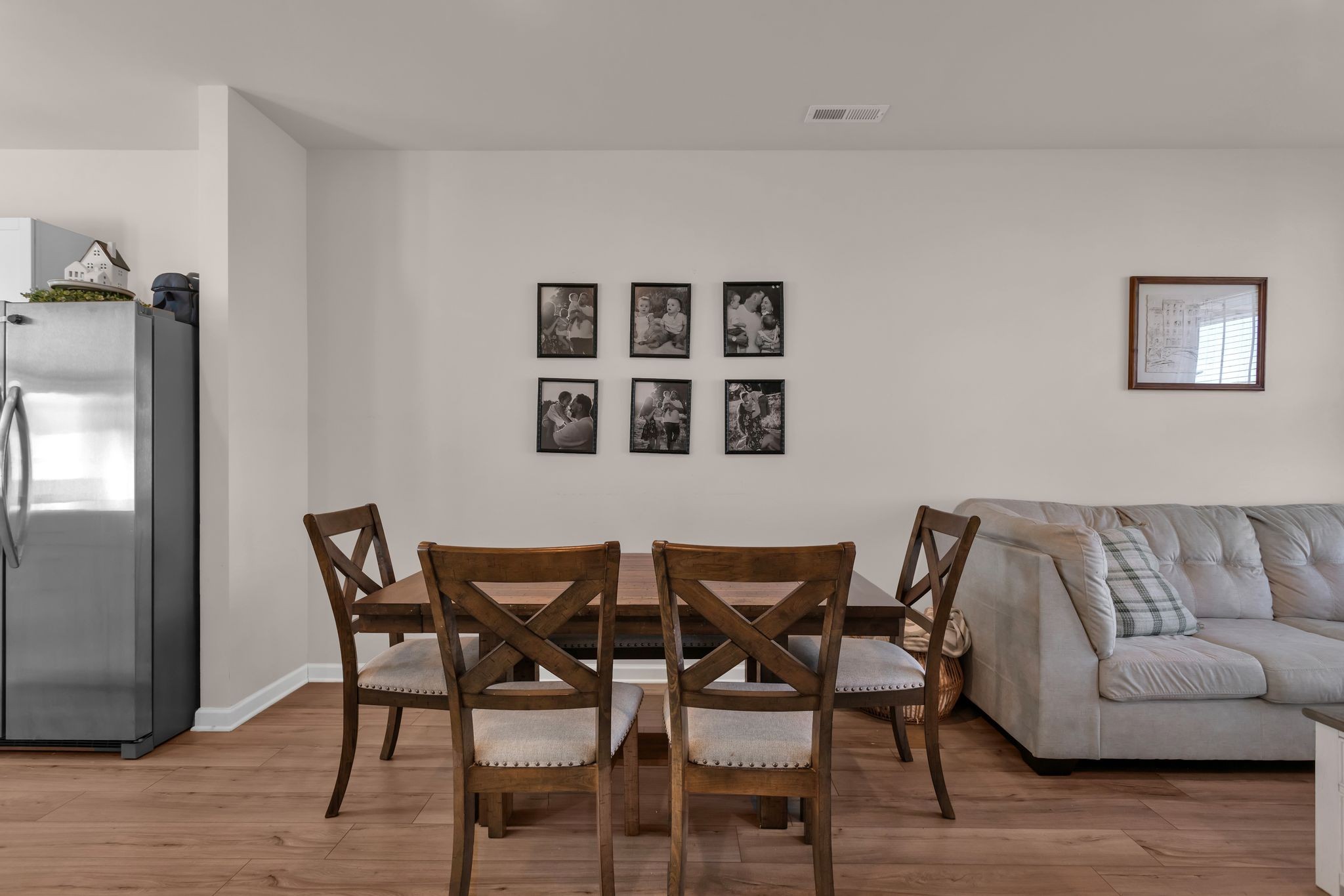 2533 Drumwright Way Columbia, TN 38401 - Photo 6 of 27 a view of a dining room with furniture and wooden floor