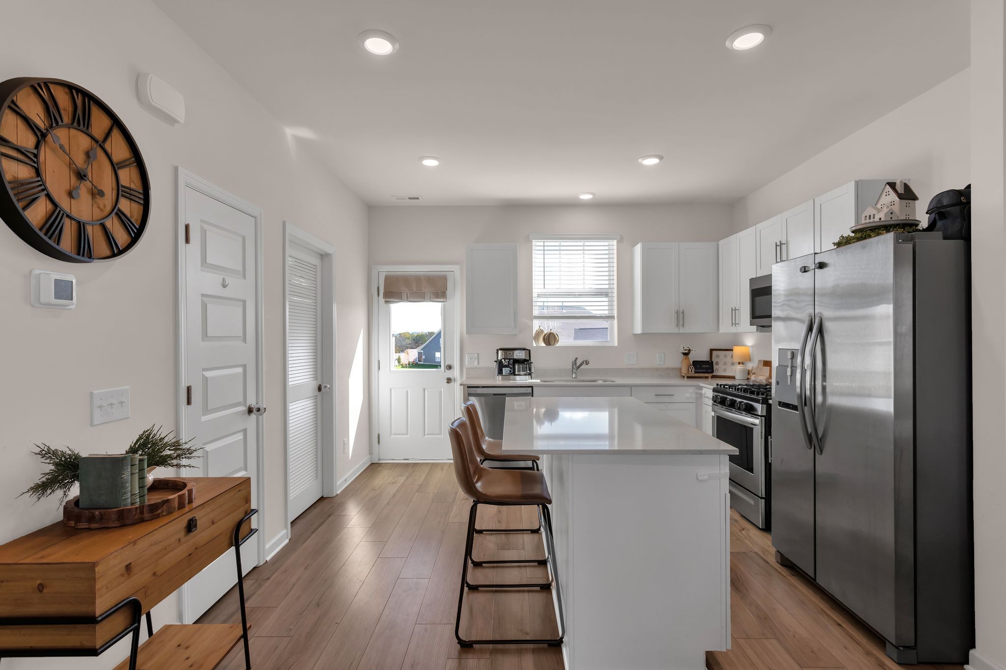 2533 Drumwright Way Columbia, TN 38401 - Photo 7 of 27 a kitchen with stainless steel appliances a refrigerator and a stove top oven