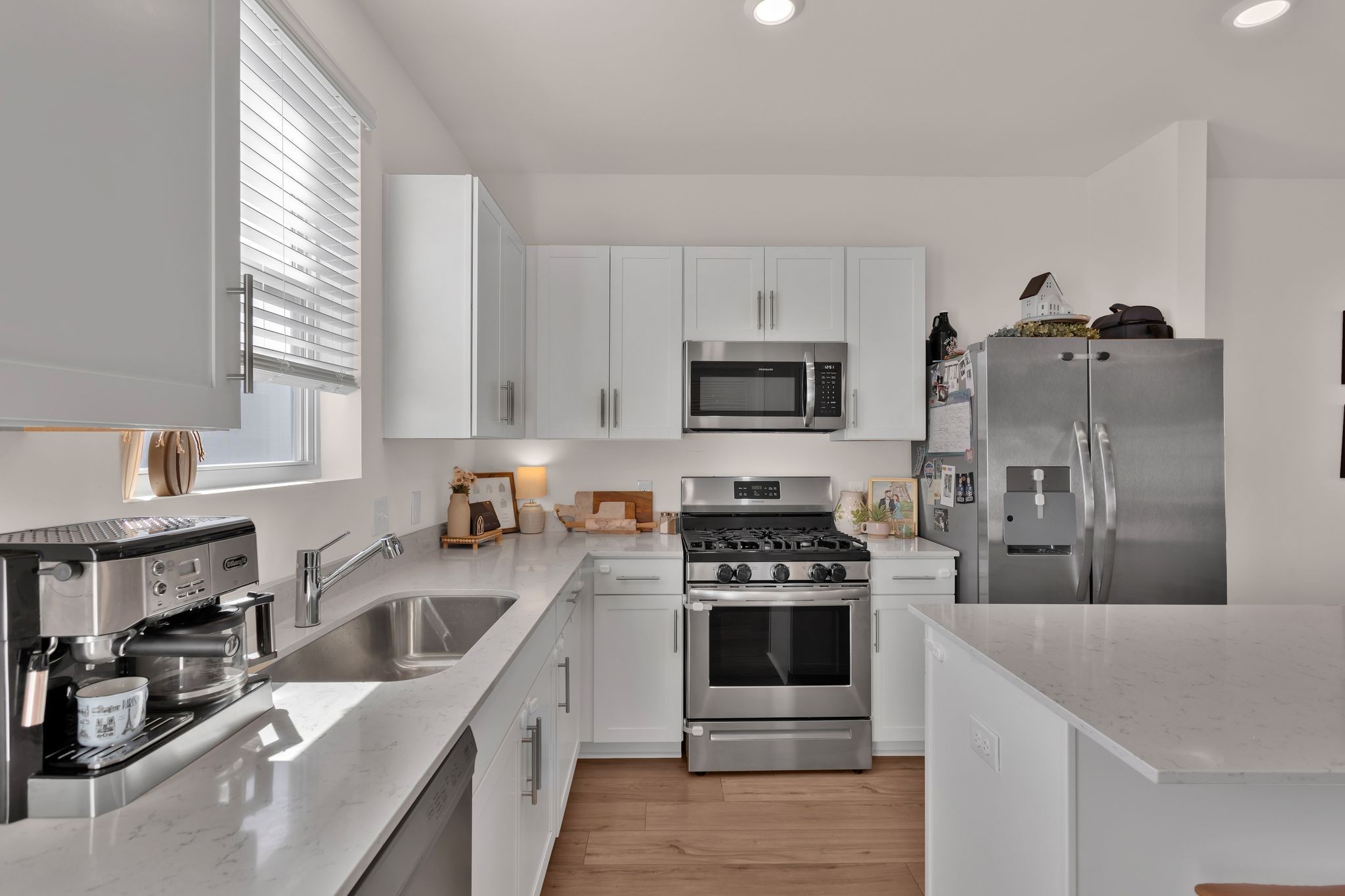 2533 Drumwright Way Columbia, TN 38401 - Photo 8 of 27 a kitchen with stainless steel appliances a stove sink microwave and refrigerator