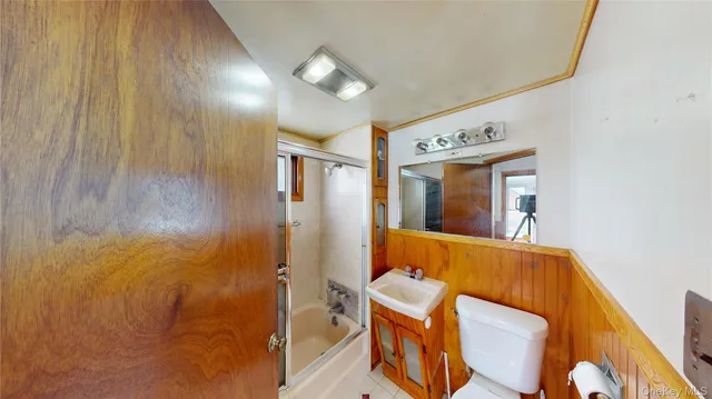 a view of a hallway with a window