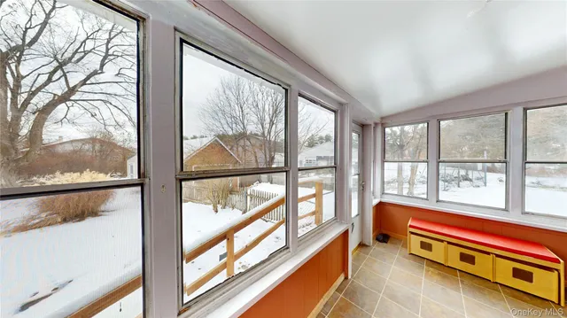 a swimming pool with outdoor seating and yard