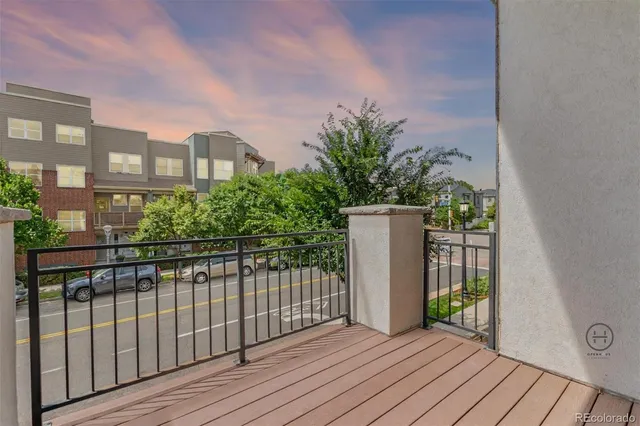 an empty room with closet and wooden door