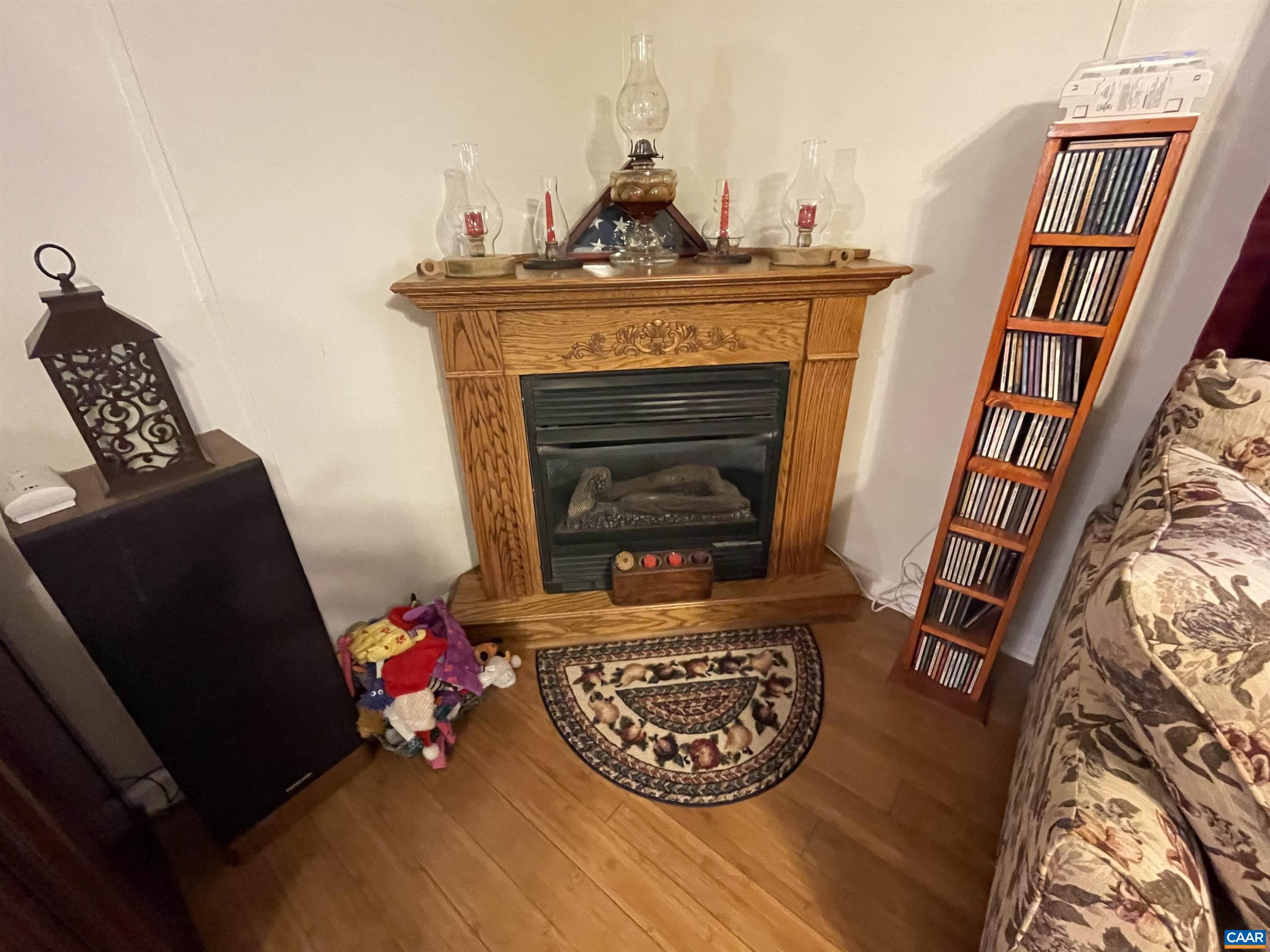 2925 Cloverdale Road Bremo Bluff, VA 23022 - Photo 11 of 23 a living room with a furniture and a fireplace