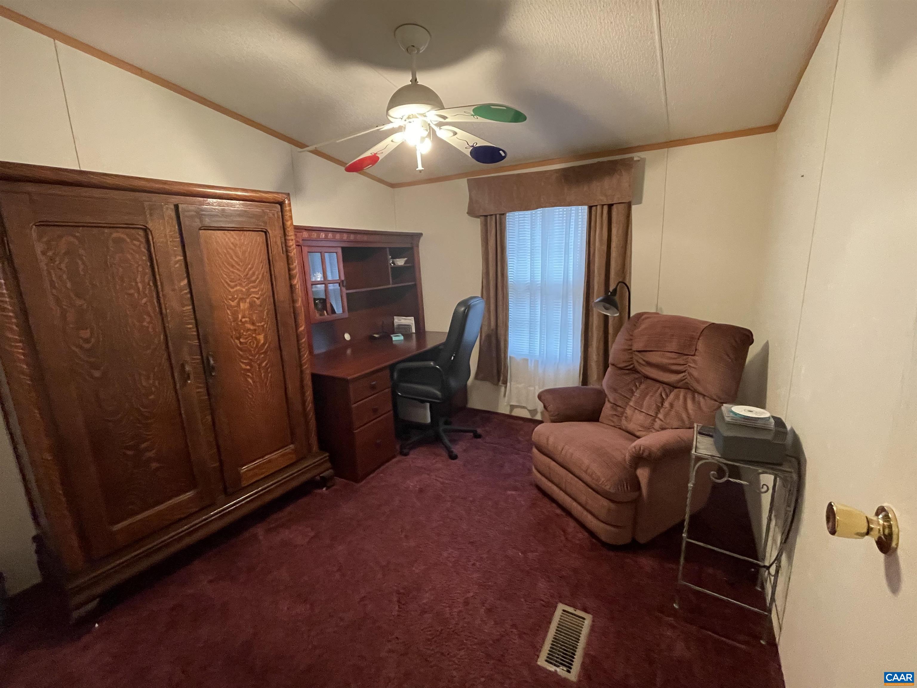 2925 Cloverdale Road Bremo Bluff, VA 23022 - Photo 17 of 23 a living room with furniture and a chandelier