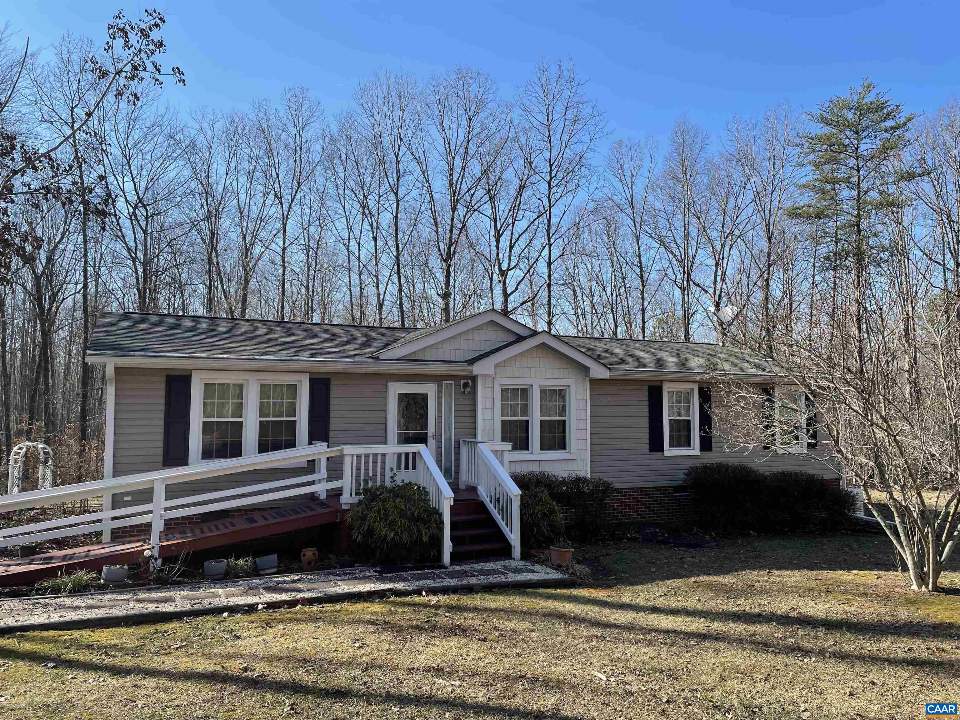 2925 Cloverdale Road Bremo Bluff, VA 23022 - Photo 21 of 23 a view of a house with a yard chairs and large tree