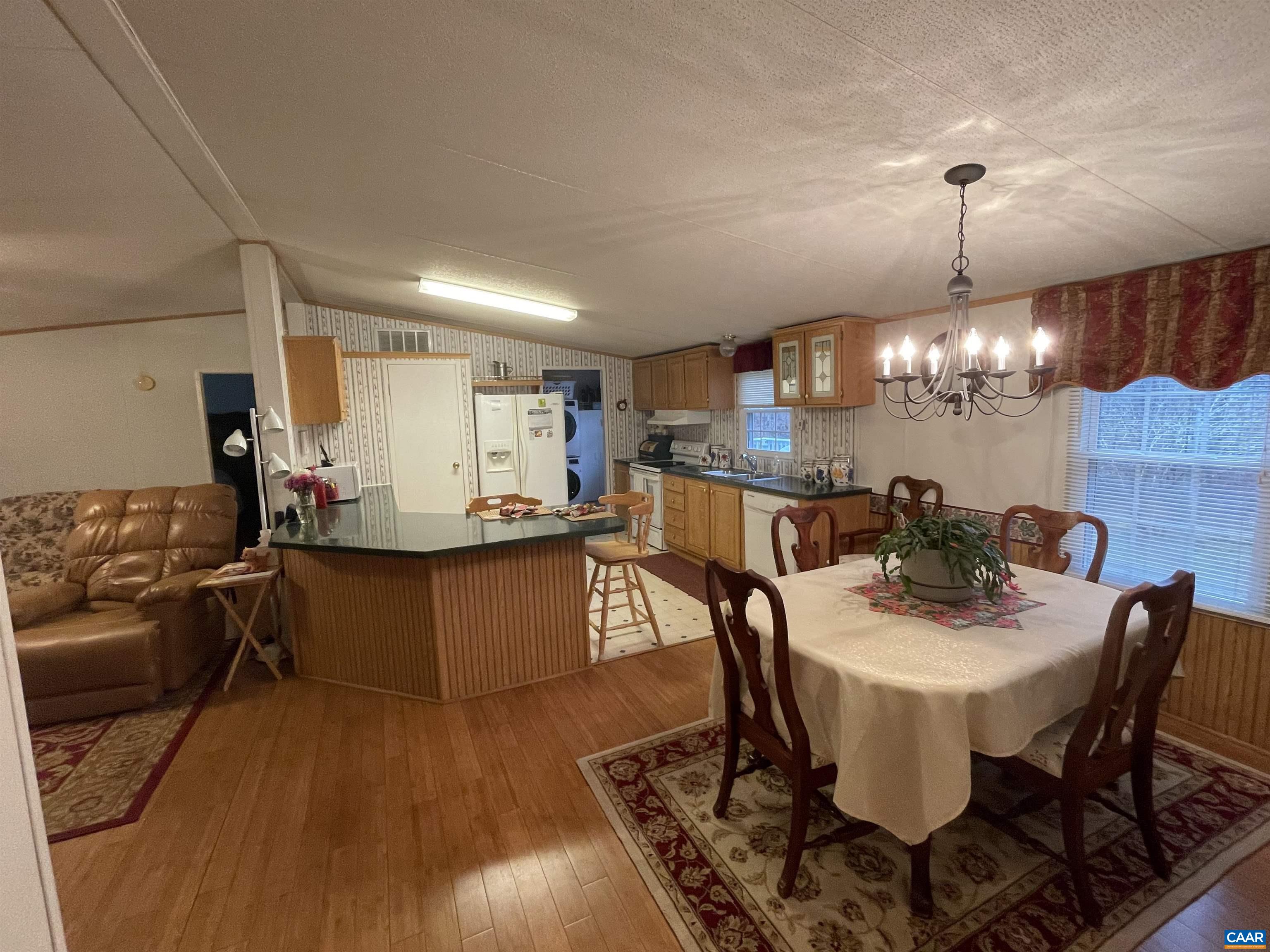 2925 Cloverdale Road Bremo Bluff, VA 23022 - Photo 10 of 23 a view of a dining room with furniture and wooden floor