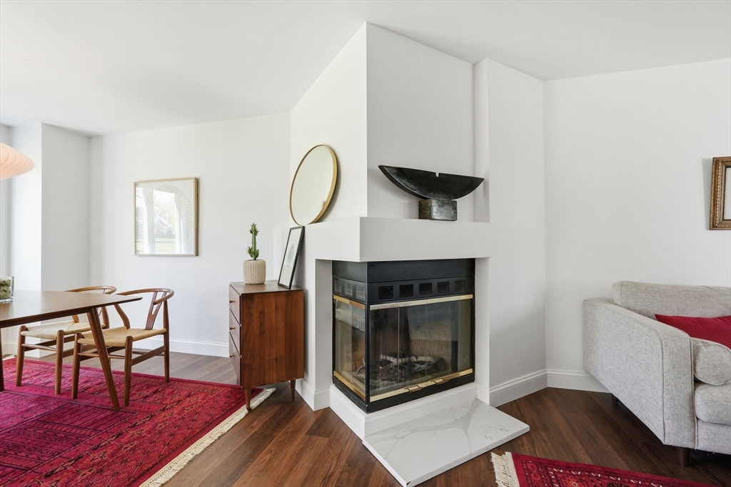 24 McIntosh Drive, Unit 24 Amherst, MA 01002 - Photo 13 of 39 a living room with furniture and a fireplace