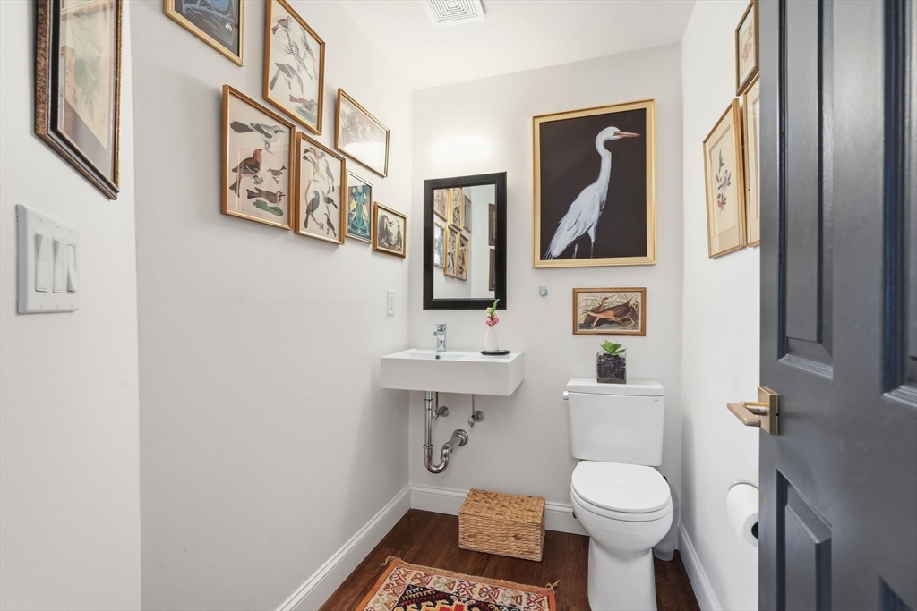24 McIntosh Drive, Unit 24 Amherst, MA 01002 - Photo 20 of 39 a bathroom with a toilet a sink and a mirror