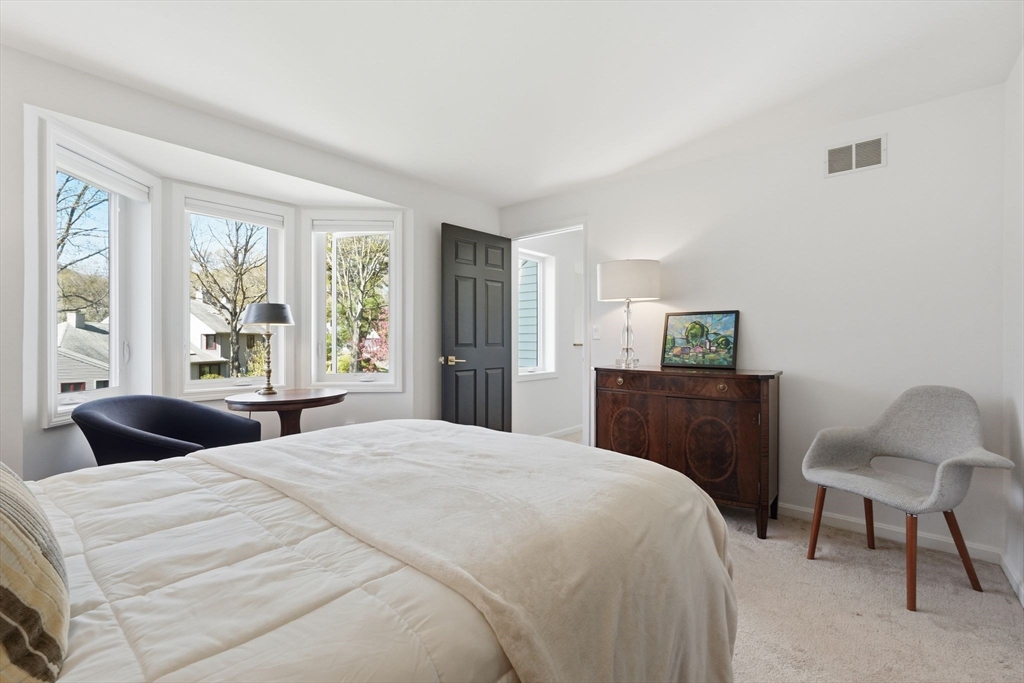 24 McIntosh Drive, Unit 24 Amherst, MA 01002 - Photo 26 of 39 a bedroom with a bed and a window