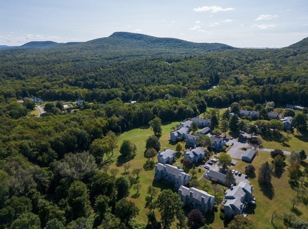 24 McIntosh Drive, Unit 24 Amherst, MA 01002 - Photo 35 of 39 an aerial view of a house with mountain view