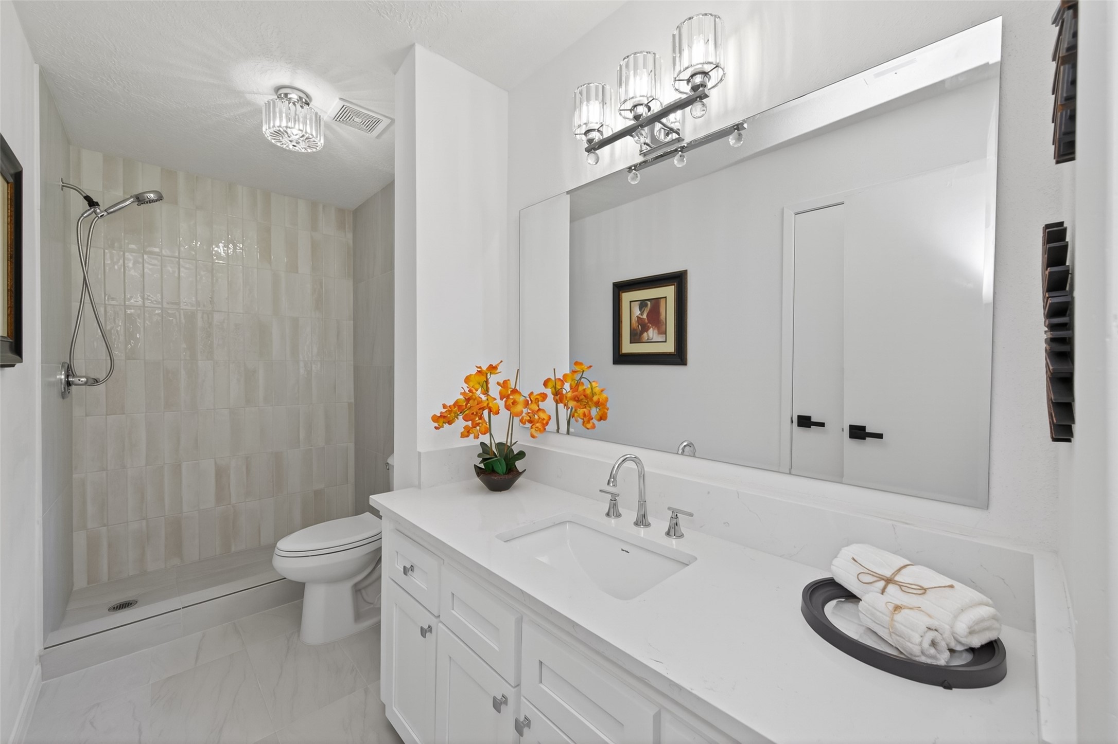 503 Allison Street Conroe, TX 77303 - Photo 27 of 34 Updated with modern tile and is a large walk-in shower.