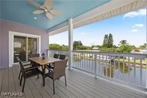 a view of a balcony with furniture