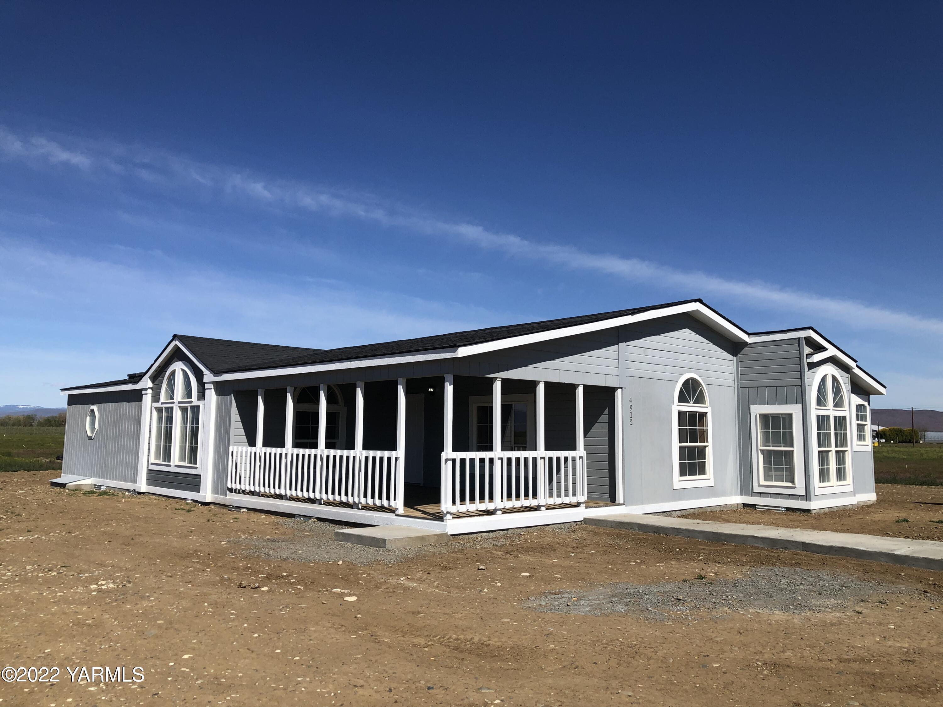 a view of a house with a roof deck