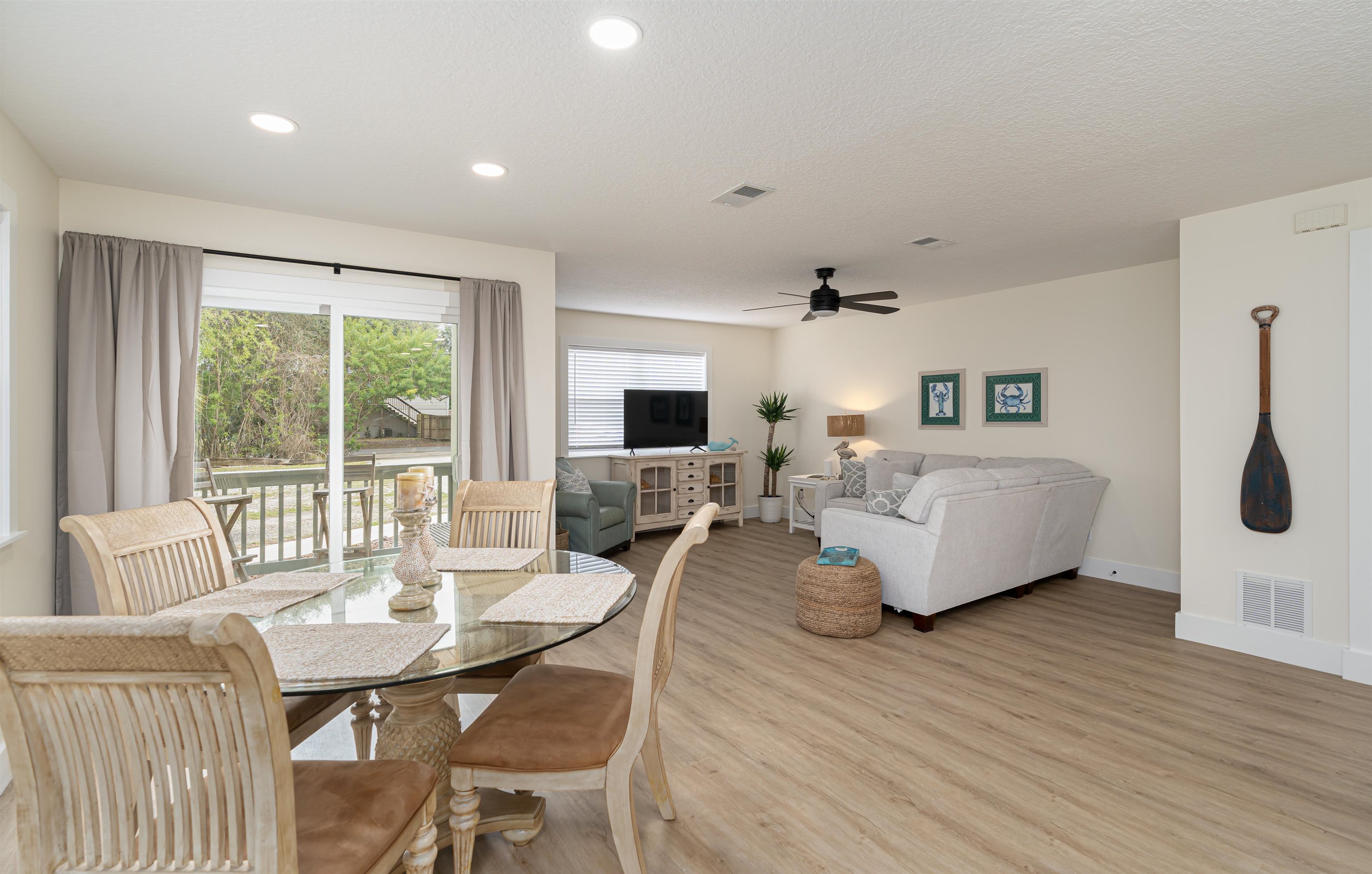 203 E Street St. Augustine, FL 32080 - Photo 10 of 68 Dining area featuring light wood-style floors, a ceiling fan, recessed lighting, and a textured ceiling