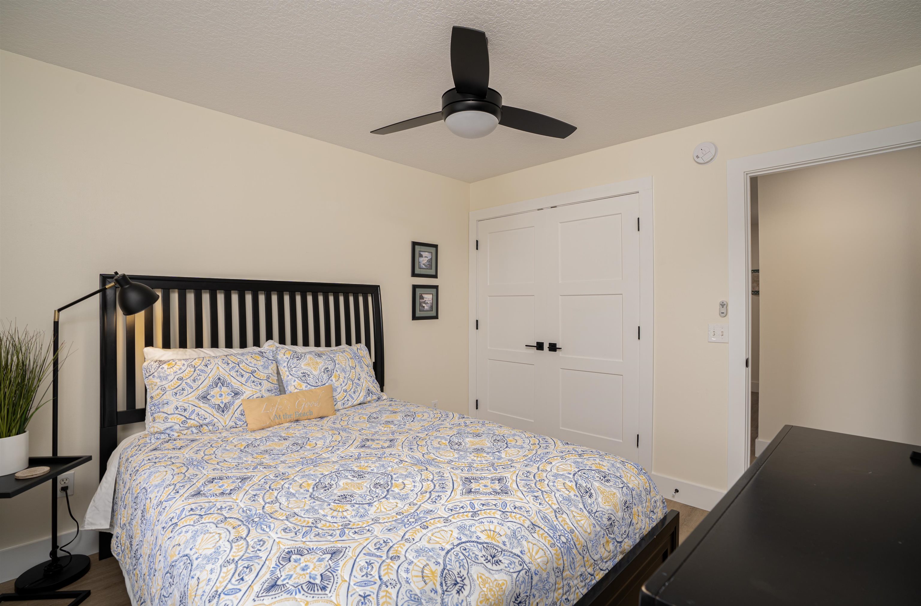 203 E Street St. Augustine, FL 32080 - Photo 18 of 68 Bedroom with a textured ceiling and a ceiling fan