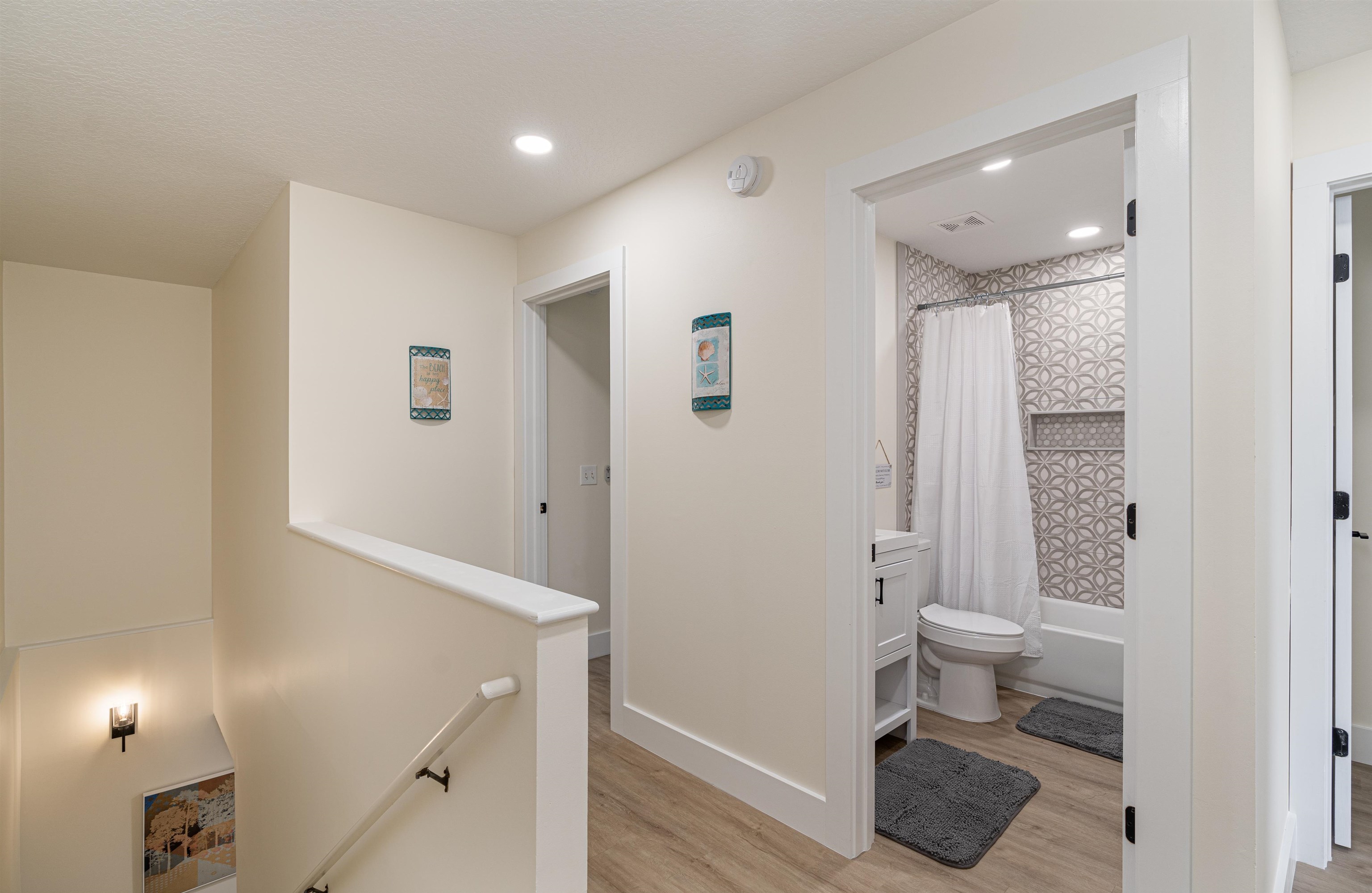 203 E Street St. Augustine, FL 32080 - Photo 19 of 68 Hallway featuring an upstairs landing, light wood-style floors, and recessed lighting