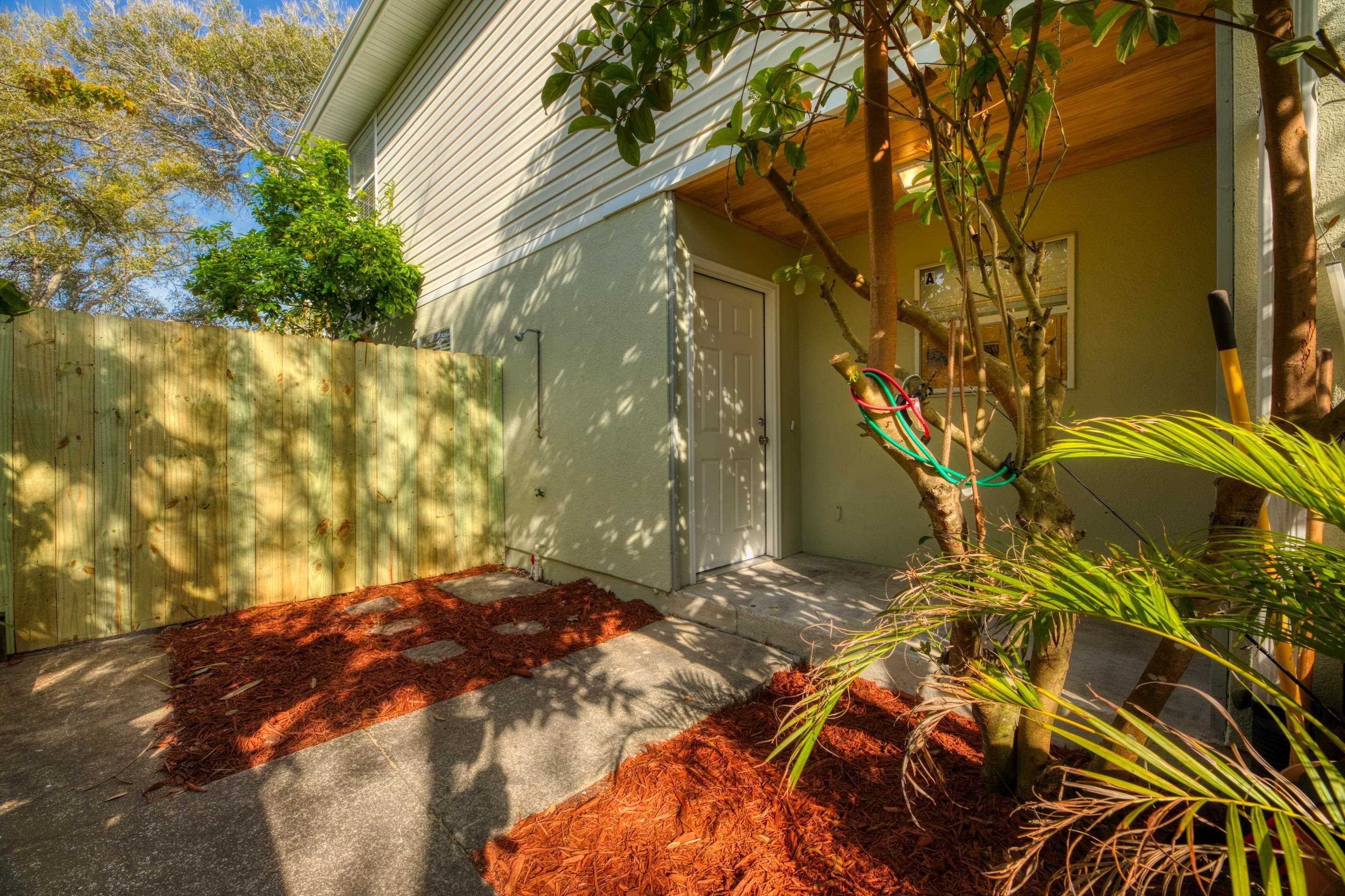 203 E Street St. Augustine, FL 32080 - Photo 27 of 68 View of home's exterior featuring stucco siding