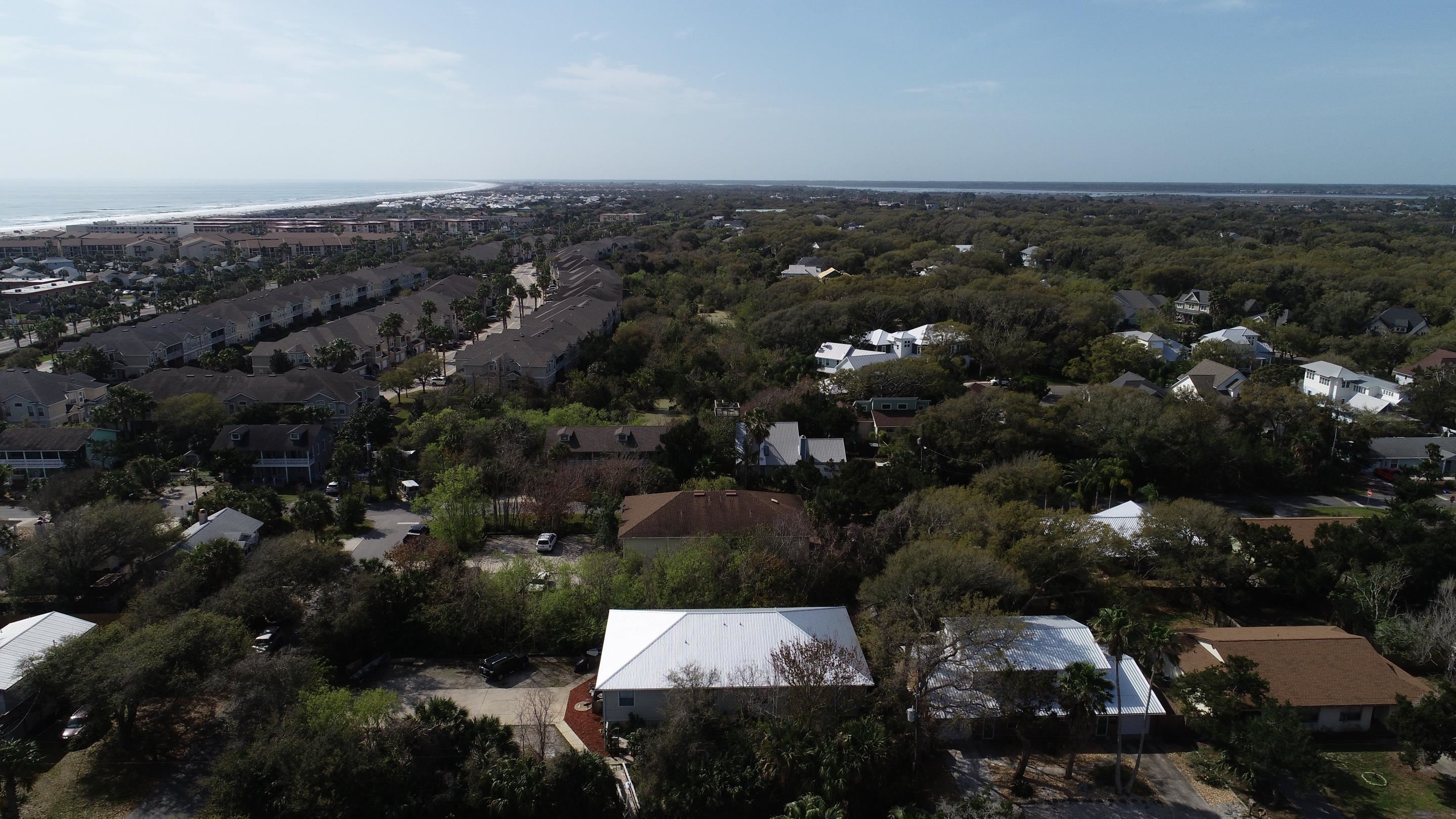 203 E Street St. Augustine, FL 32080 - Photo 62 of 68 Aerial overview of property's location featuring a large body of water and nearby suburban area