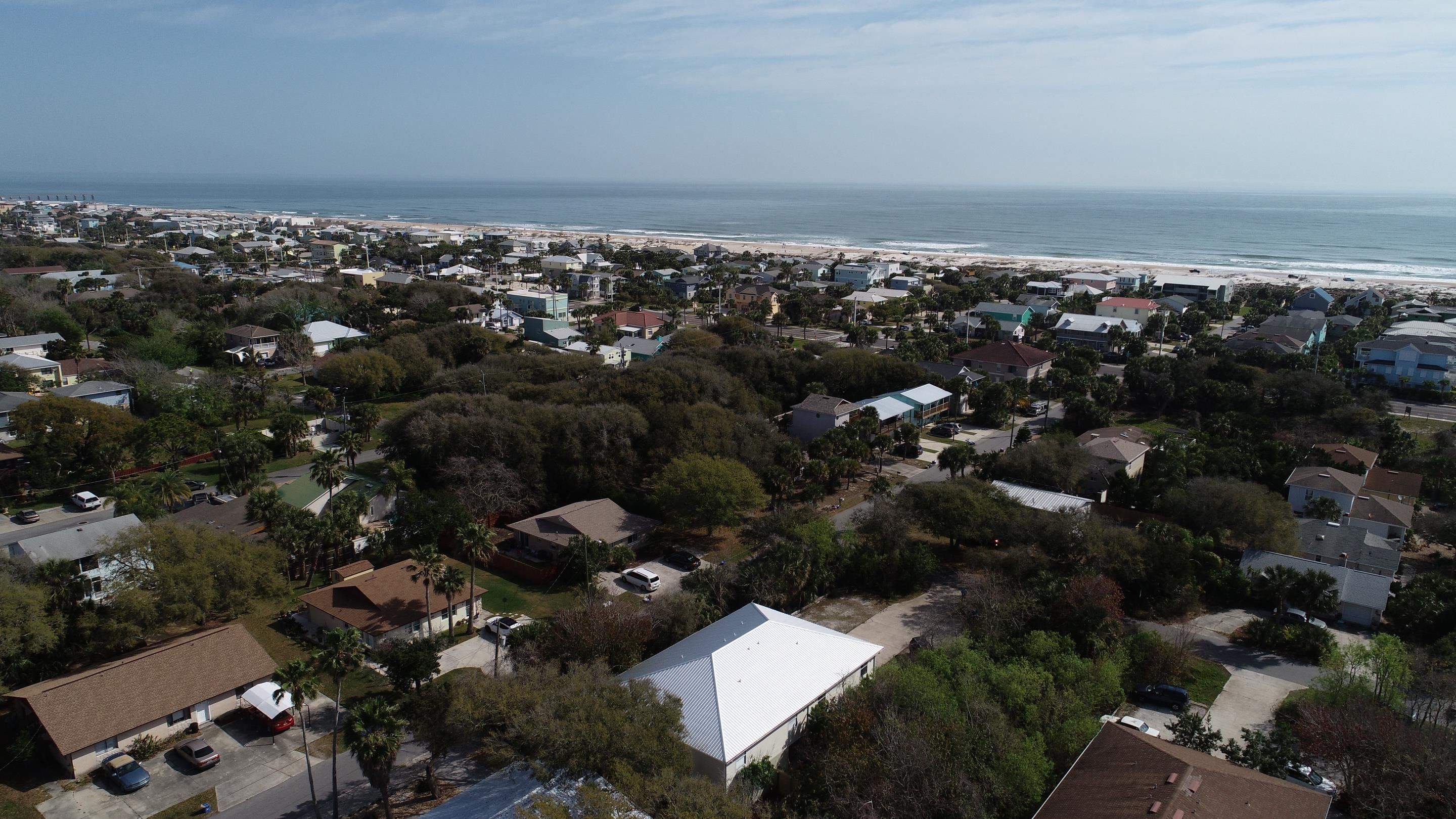 203 E Street St. Augustine, FL 32080 - Photo 65 of 68 Aerial view of property and surrounding area with a nearby body of water and nearby suburban area