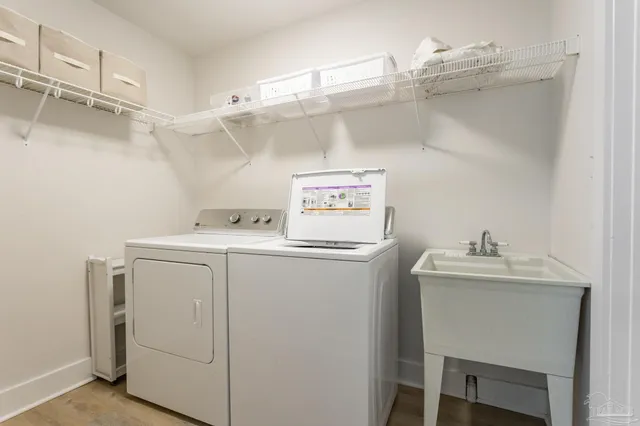 a utility room with dryer and washer