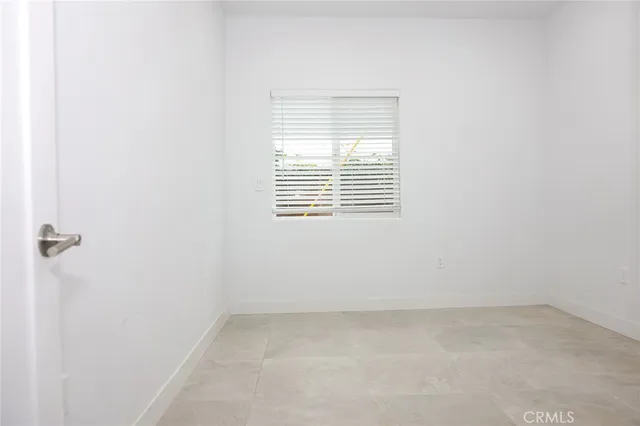 a view of a room that has a window in it