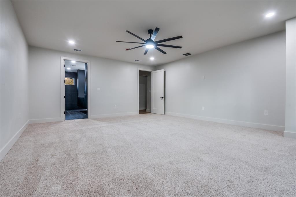 6301 Tiffany Oaks Lane Arlington, TX 76016 - Photo 19 of 40 a view of an empty room with a ceiling fan