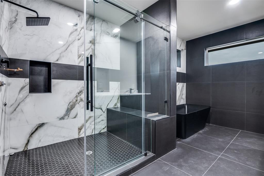 6301 Tiffany Oaks Lane Arlington, TX 76016 - Photo 21 of 40 a bathroom with a sink a toilet and shower