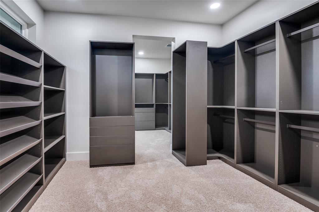 6301 Tiffany Oaks Lane Arlington, TX 76016 - Photo 23 of 40 a view of closet area with empty racks