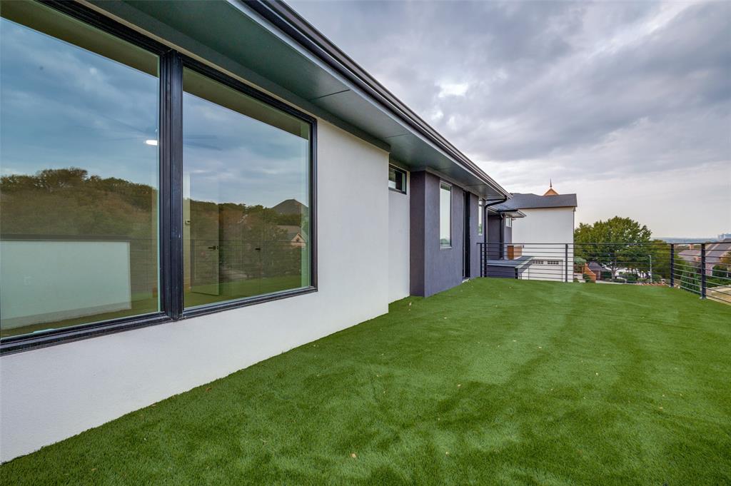 6301 Tiffany Oaks Lane Arlington, TX 76016 - Photo 37 of 40 a view of a back yard from a balcony