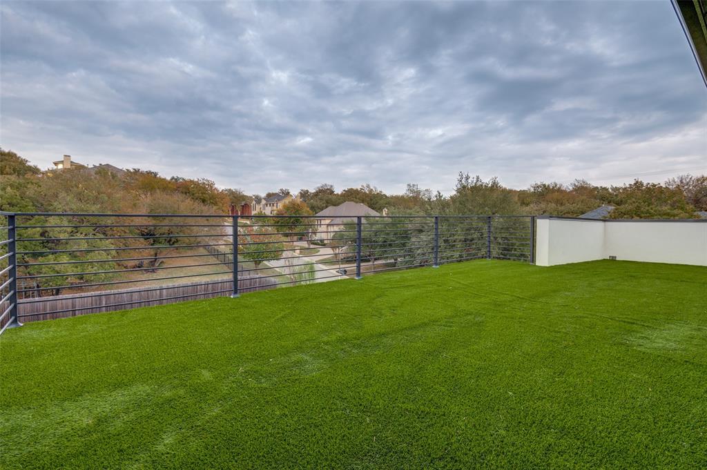 6301 Tiffany Oaks Lane Arlington, TX 76016 - Photo 38 of 40 a view of a big yard with a large tree