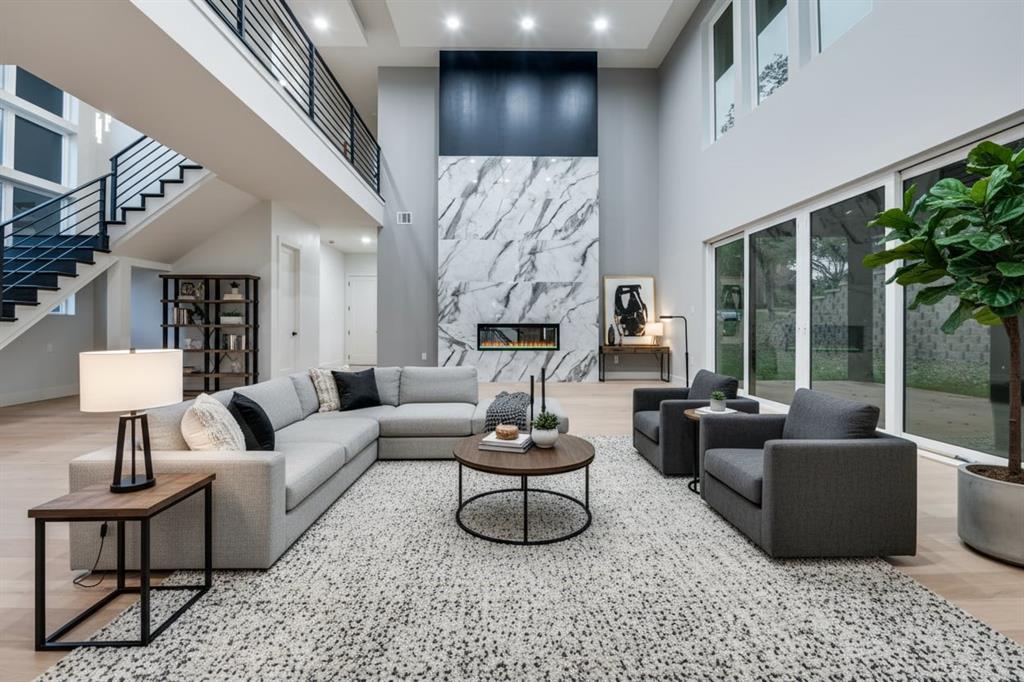 6301 Tiffany Oaks Lane Arlington, TX 76016 - Photo 6 of 40 a living room with furniture and a large window