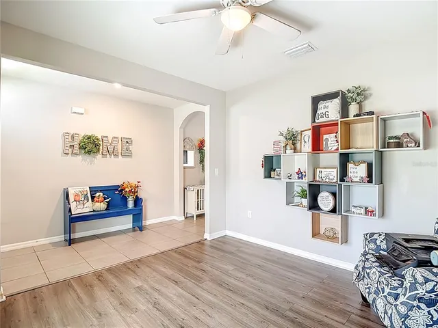 a kitchen with cabinets and stainless steel appliances